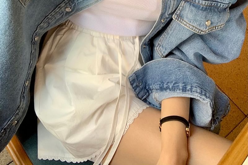Coris - Shorts met hoge taille en kanten rand