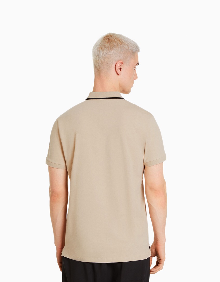 Camisa polo listrada de manga curta
