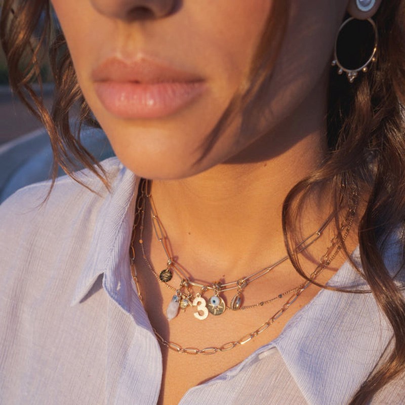 Collier multi rangs en acier doré