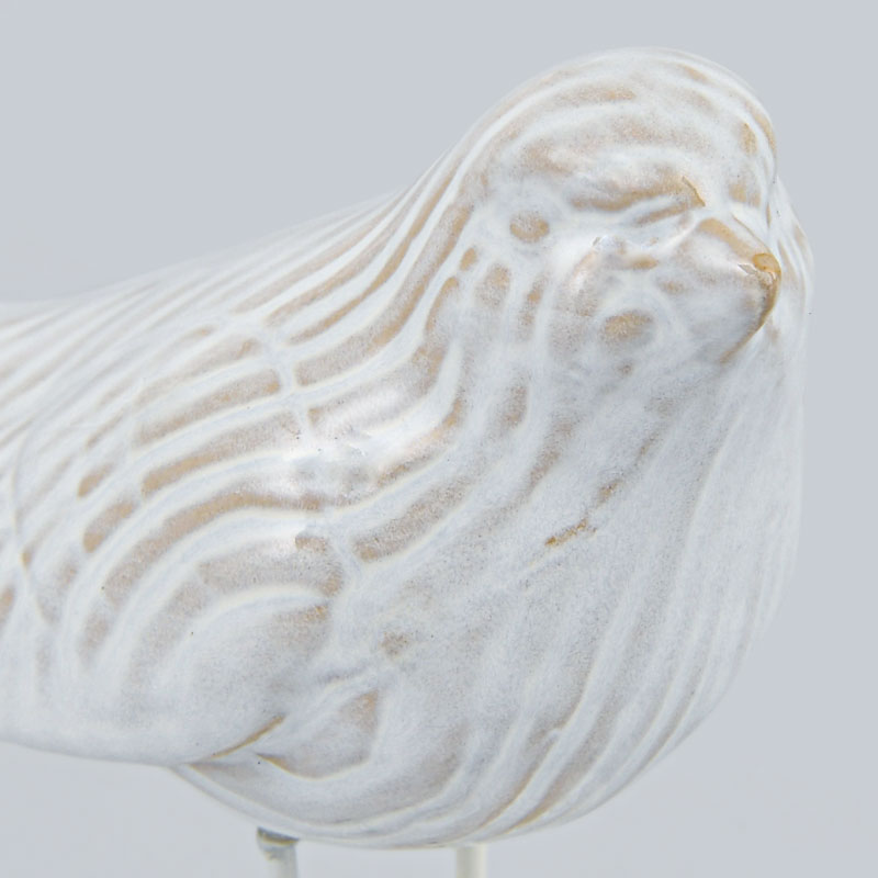 Oiseau décoratif sur support en grès crème
