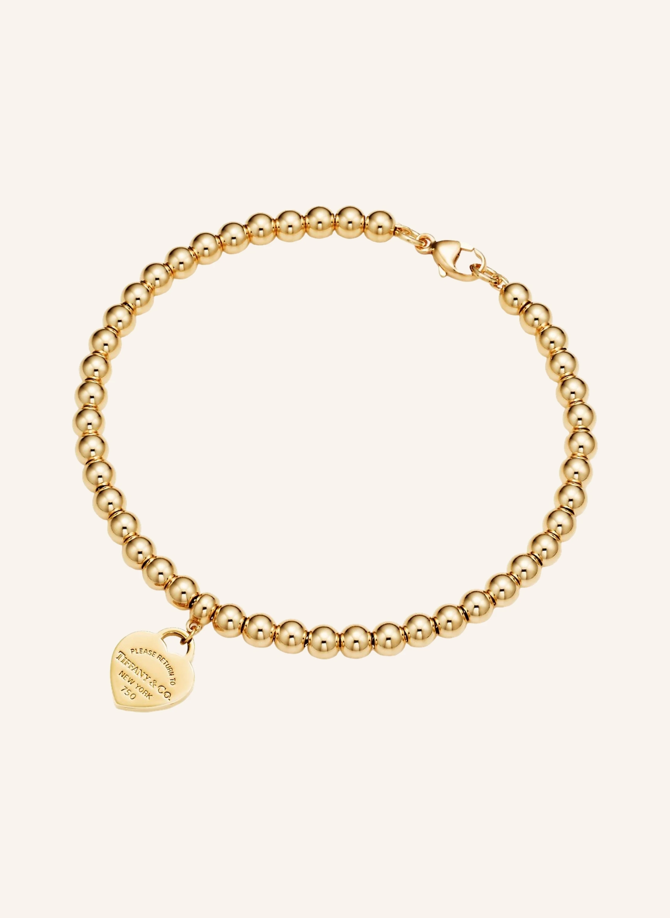 TIFFANY & Co. Return to Tiffany™ KUGELARMBAND MIT HERZANHÄNGER aus 18 Karat Gold