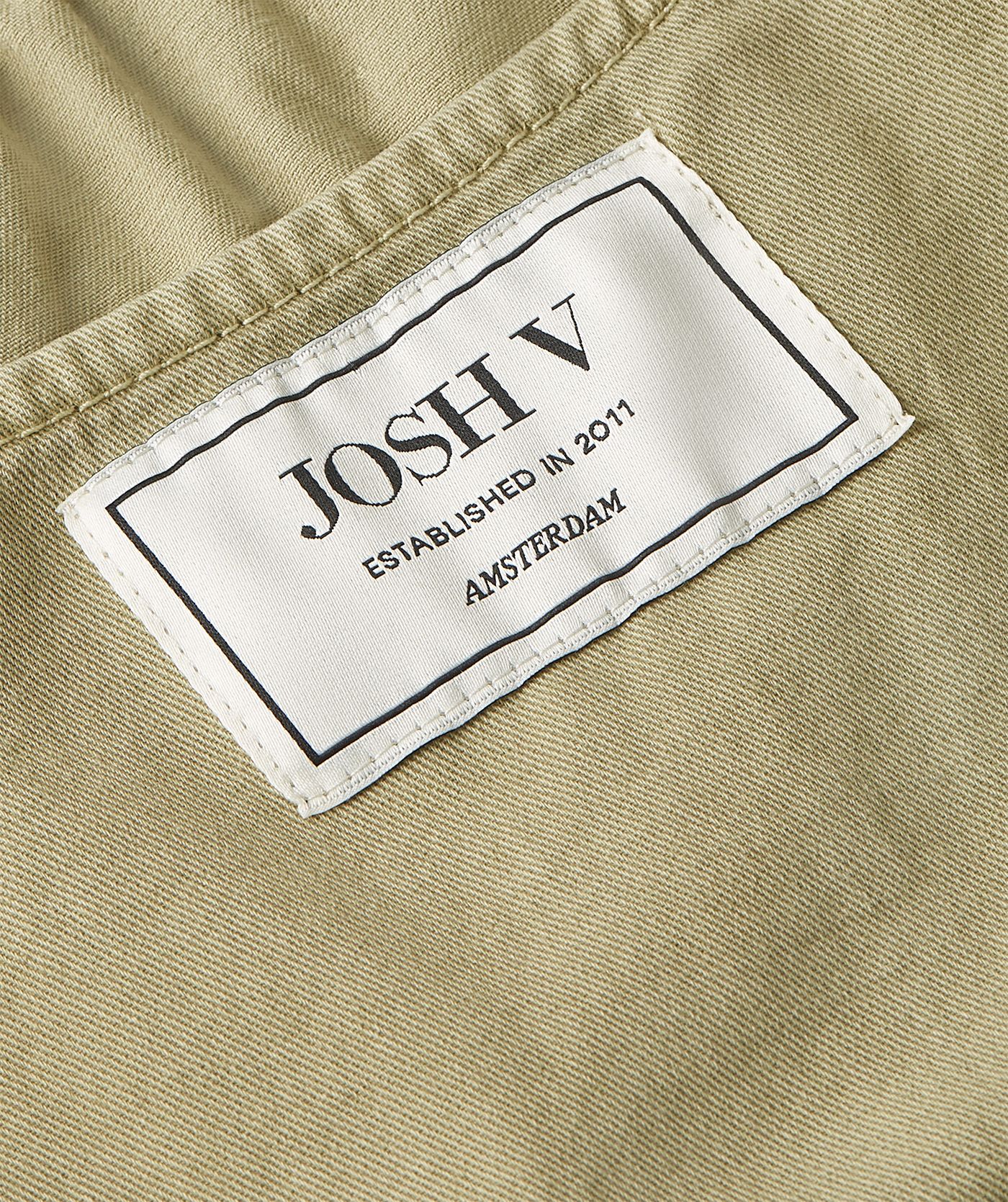 JV-SEA getailleerde top met peplum - dark pistachio