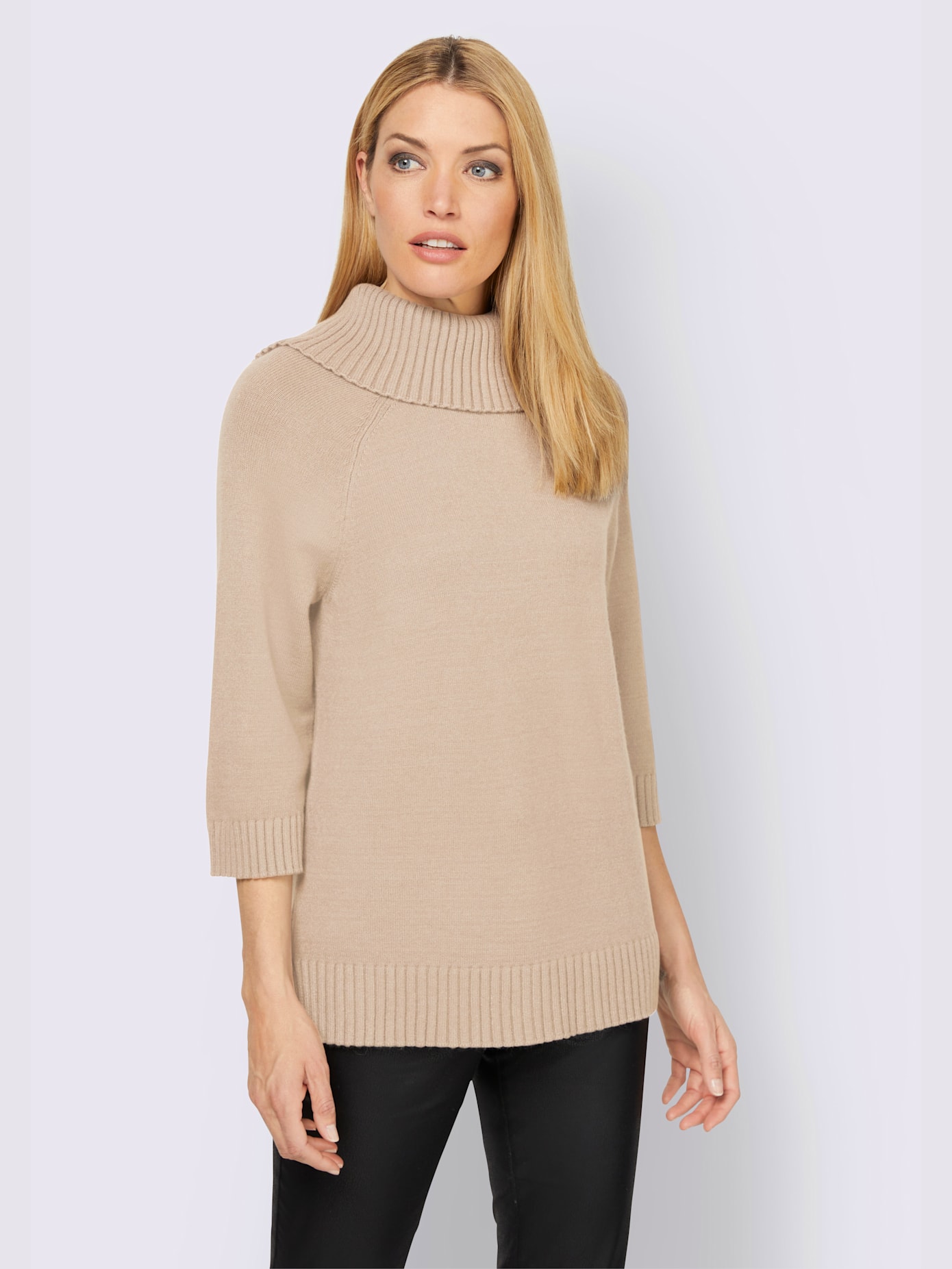Pull à col roulé plus long au dos
