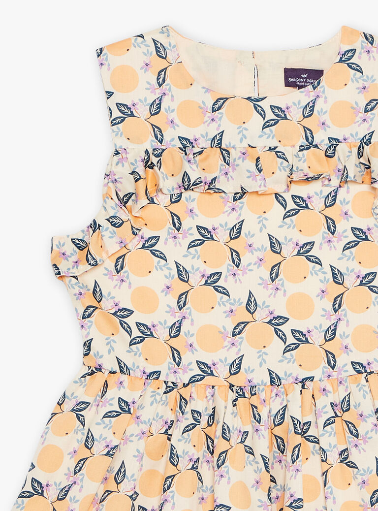 Robe vanille à volants et à motif oranges