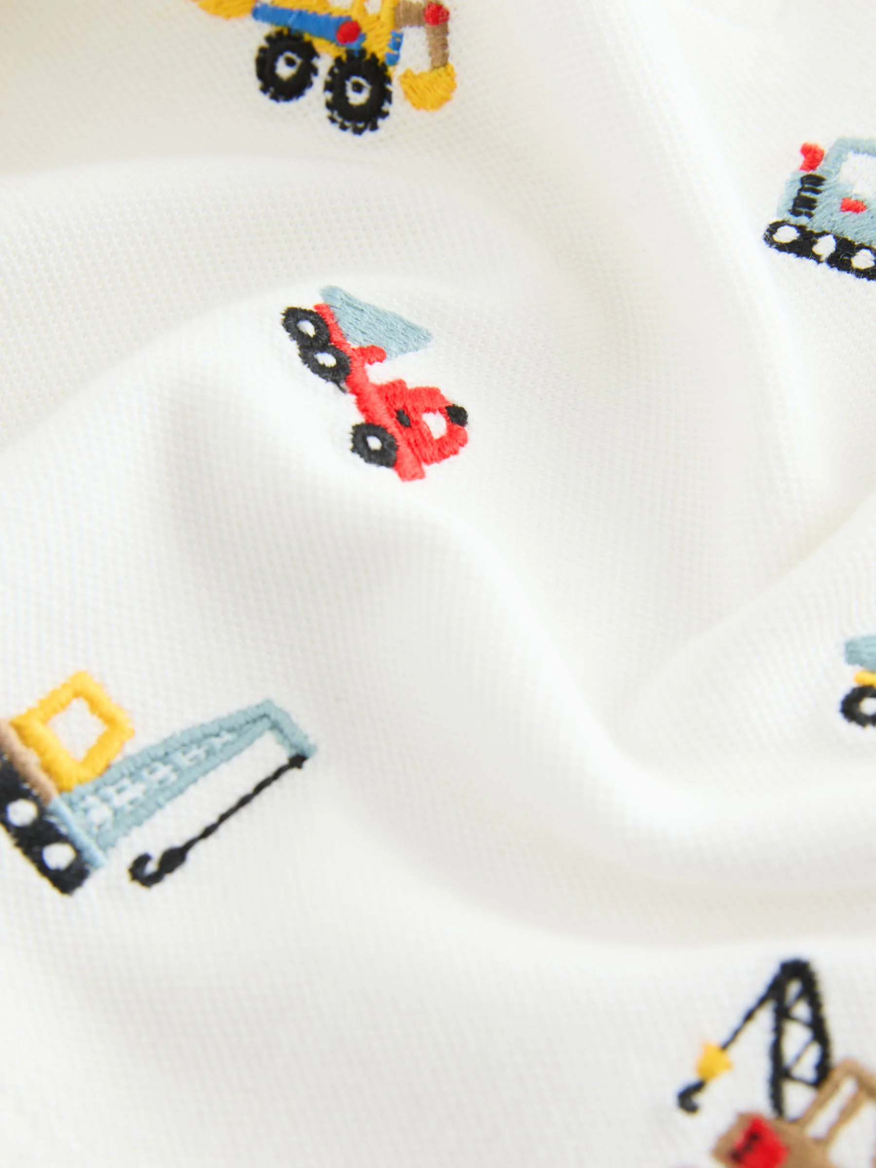 Wit graafmachine - Poloshirt met all-over borduursel en lange mouwen (3mnd-7jr)