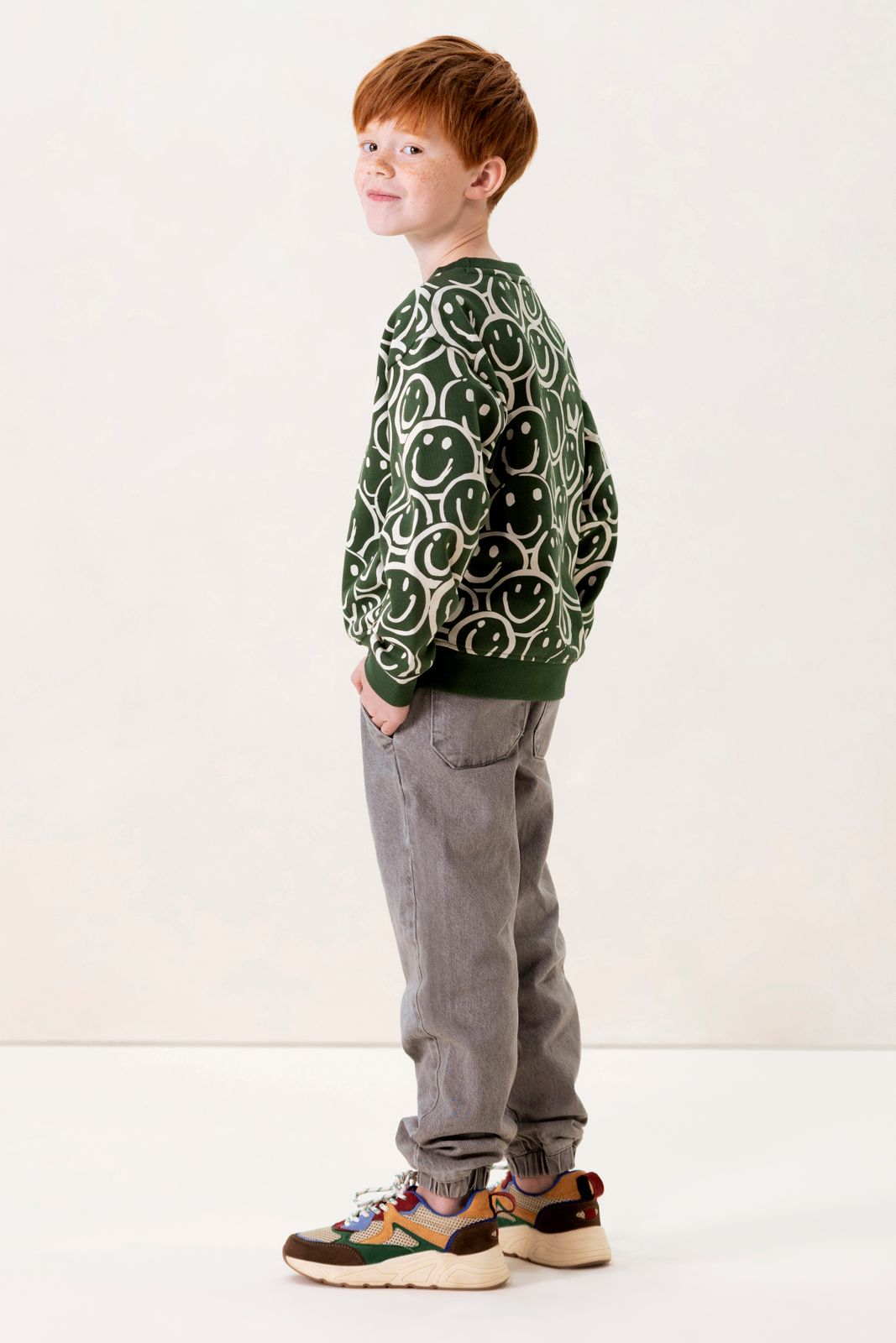 Groene sweater met smiley print
