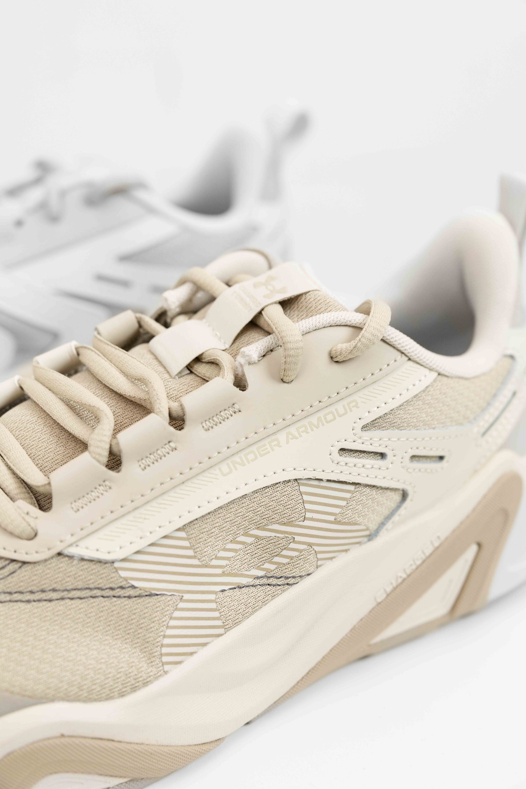 Under Armour Charged Commit TR 5 Sneakers Heren Beige