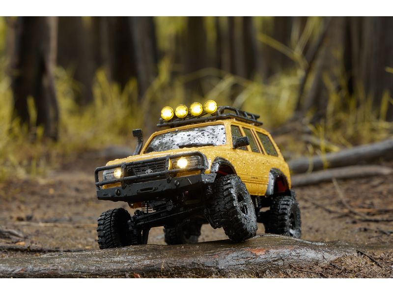 FMS Scale Crawler FCX18 Toyota LC80 Gelb, RTR, 1:18 Mini Rock Crawler mit detaillierter Toyota Landcruiser Karosserie und 2-Gang Getriebe