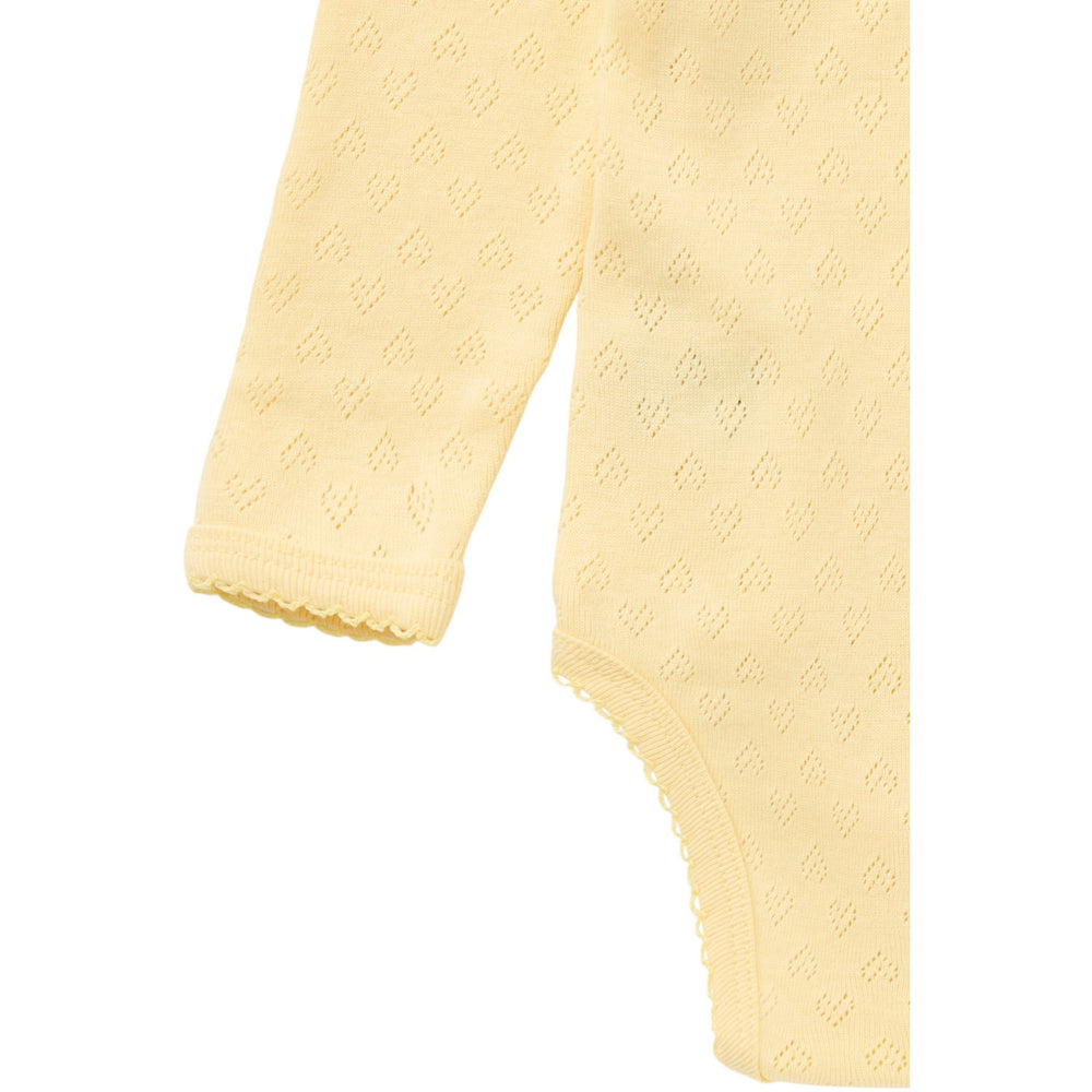 Køb COPENHAGEN COLORS Pale Yellow Pointelle Heart Crossover Body Ls