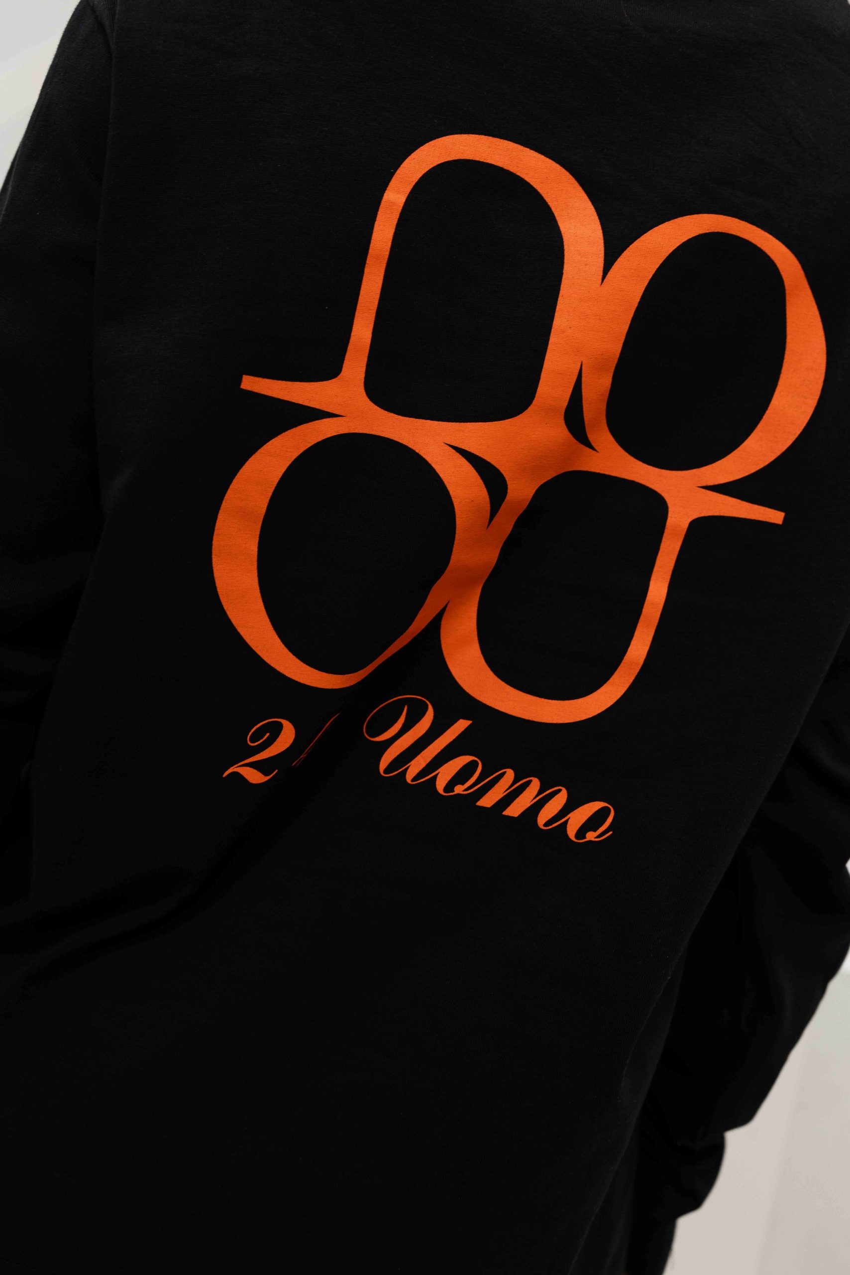24 Uomo Symbol Longsleeve Shirt Dames Zwart/Oranje