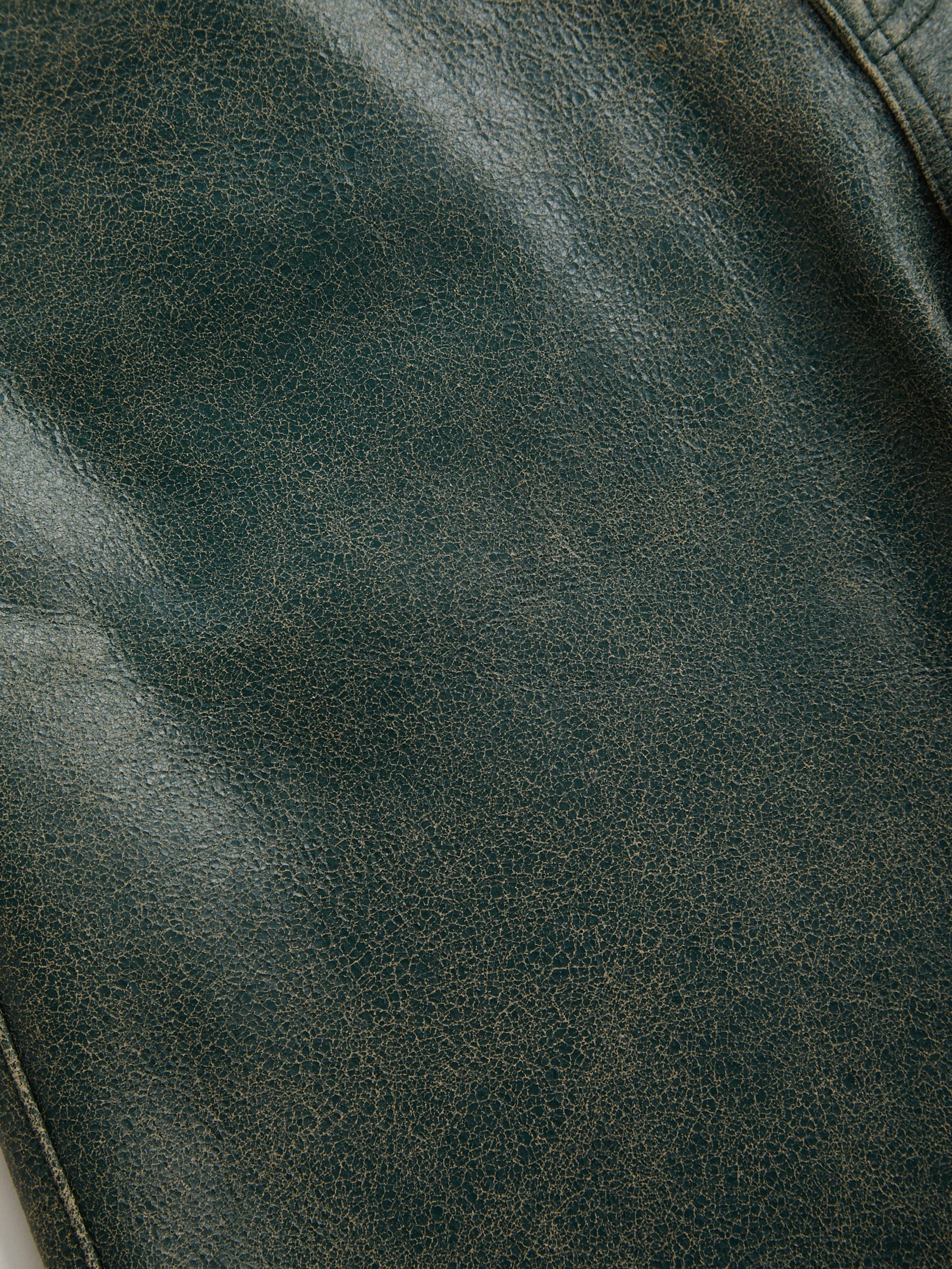 calça de couro craquelado