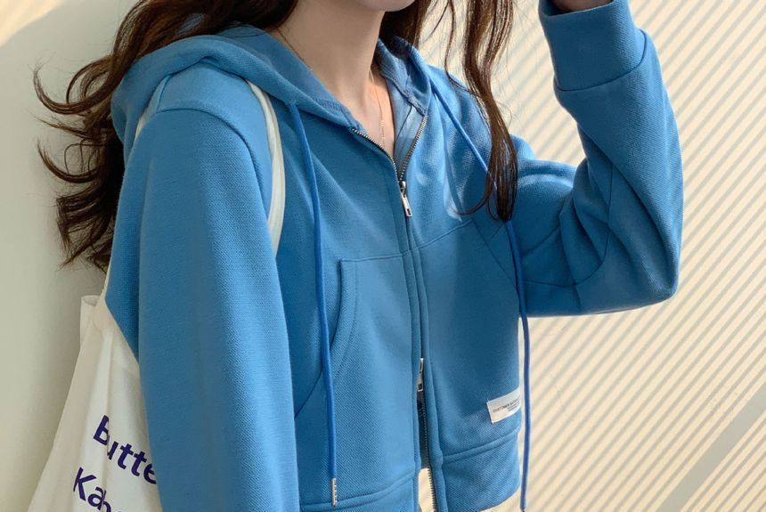 Cossita - Effen appliqué crop hoodie met rits