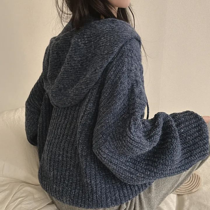 MIKIGA - Oversized kabelgebreide hoodie met rits
