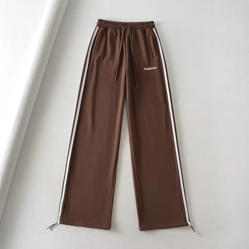 Reknovine - Wijde joggingbroek met trekkoord en gestreepte letters