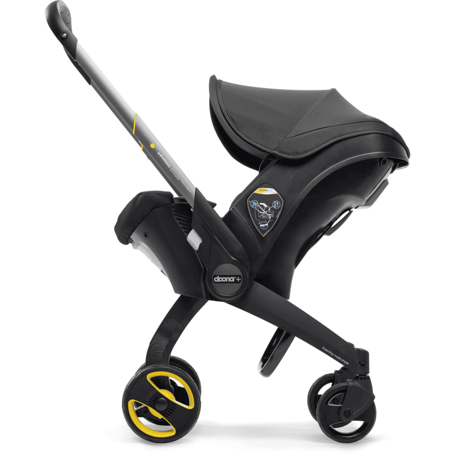 doona Babyschale Nitro Black  schwarz mit voll integriertem Fahrgestell, 2 in 1