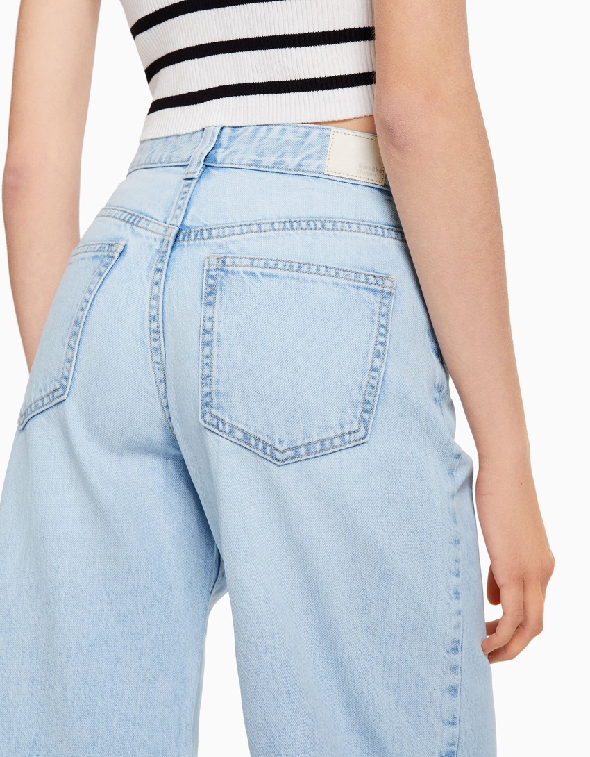 calças jeans cropped de perna larga
