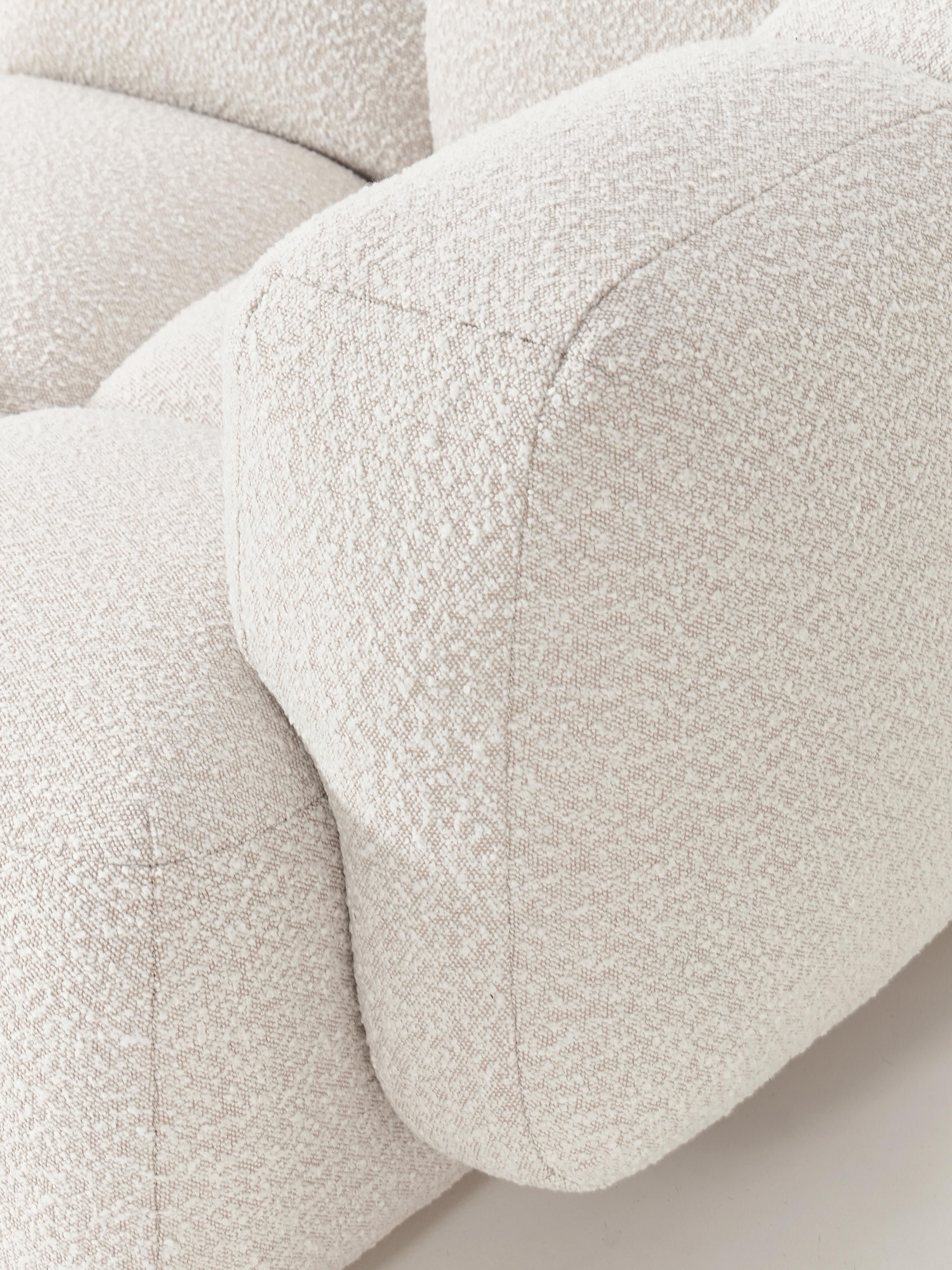 Modulaire bank Tayla (4-zits) van bouclé met poef (links/rechts)