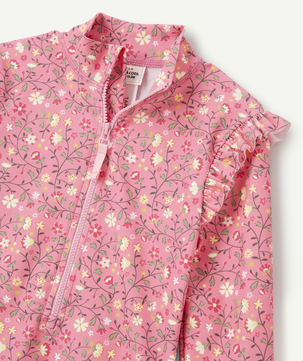 COMBINAISON ANTI-UV FILLE EN FIBRES RECYCLÉES ROSE AVEC IMPRIMÉ FLEURS