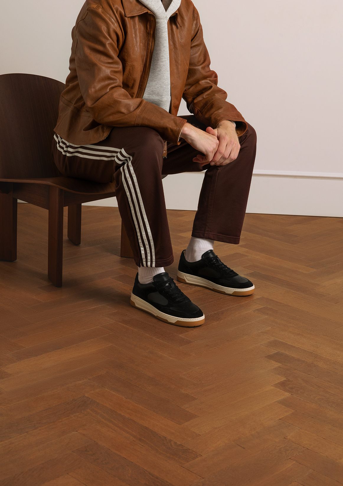 Zwarte leren sneakers met suède details