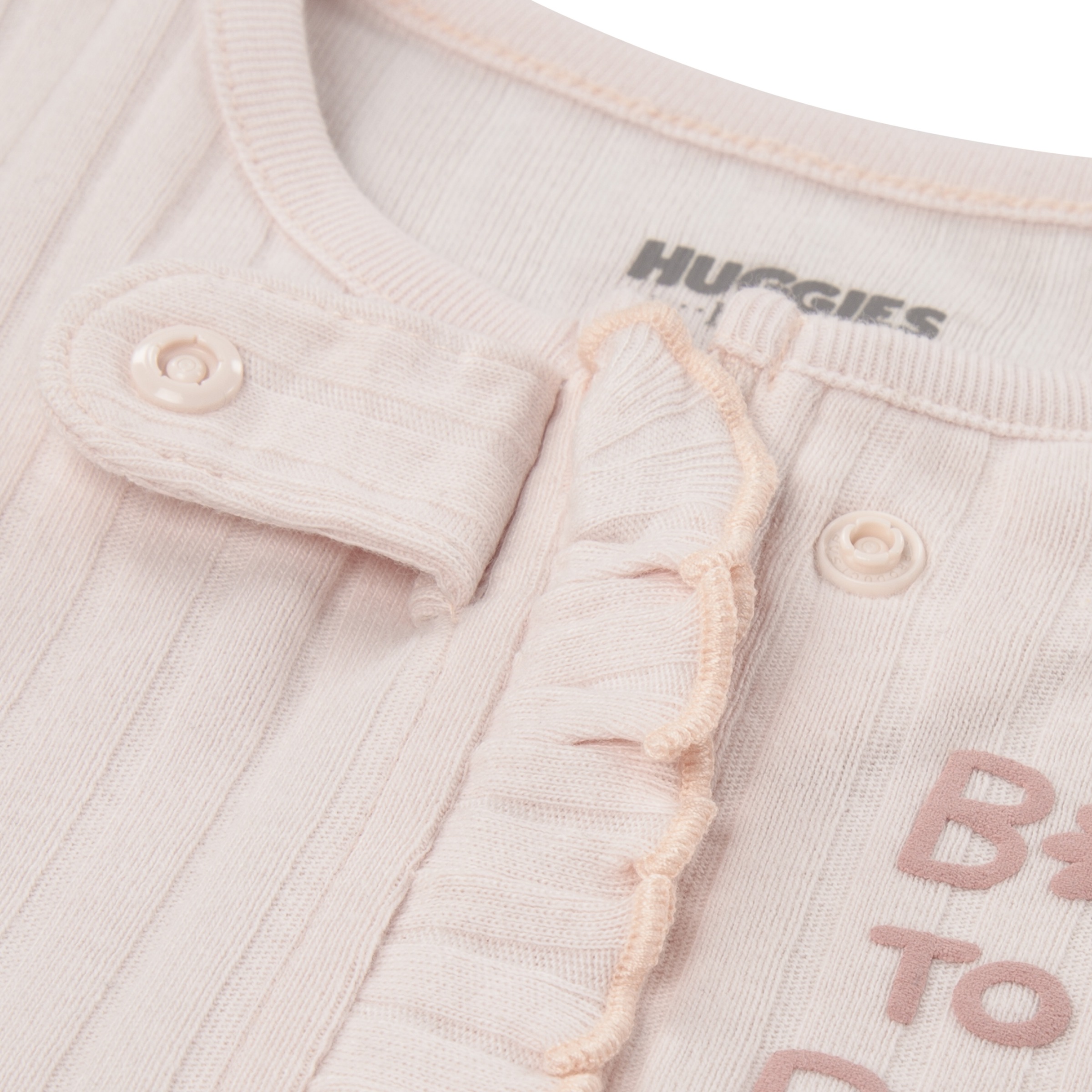 HUGGIES babywear Strampler »HUGG FOOTED COVERALL«, mit Rüschenbesatz