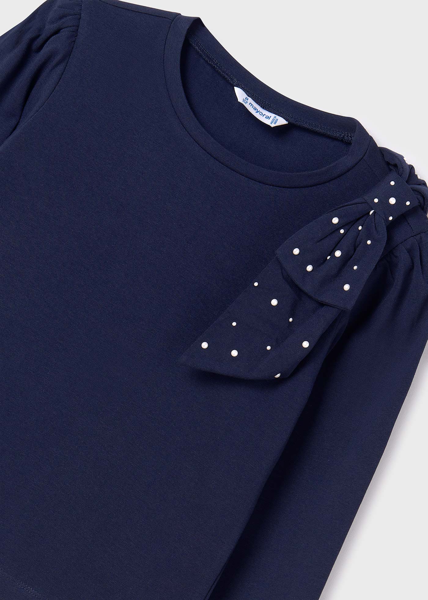 Camiseta infantil Better Cotton com laço