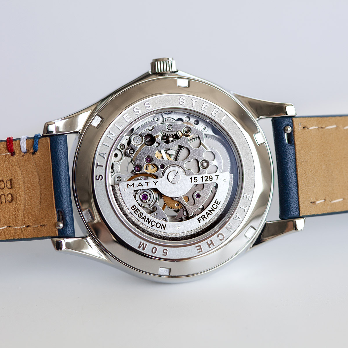 Montre homme squelette automatique acier bracelet cuir bleu