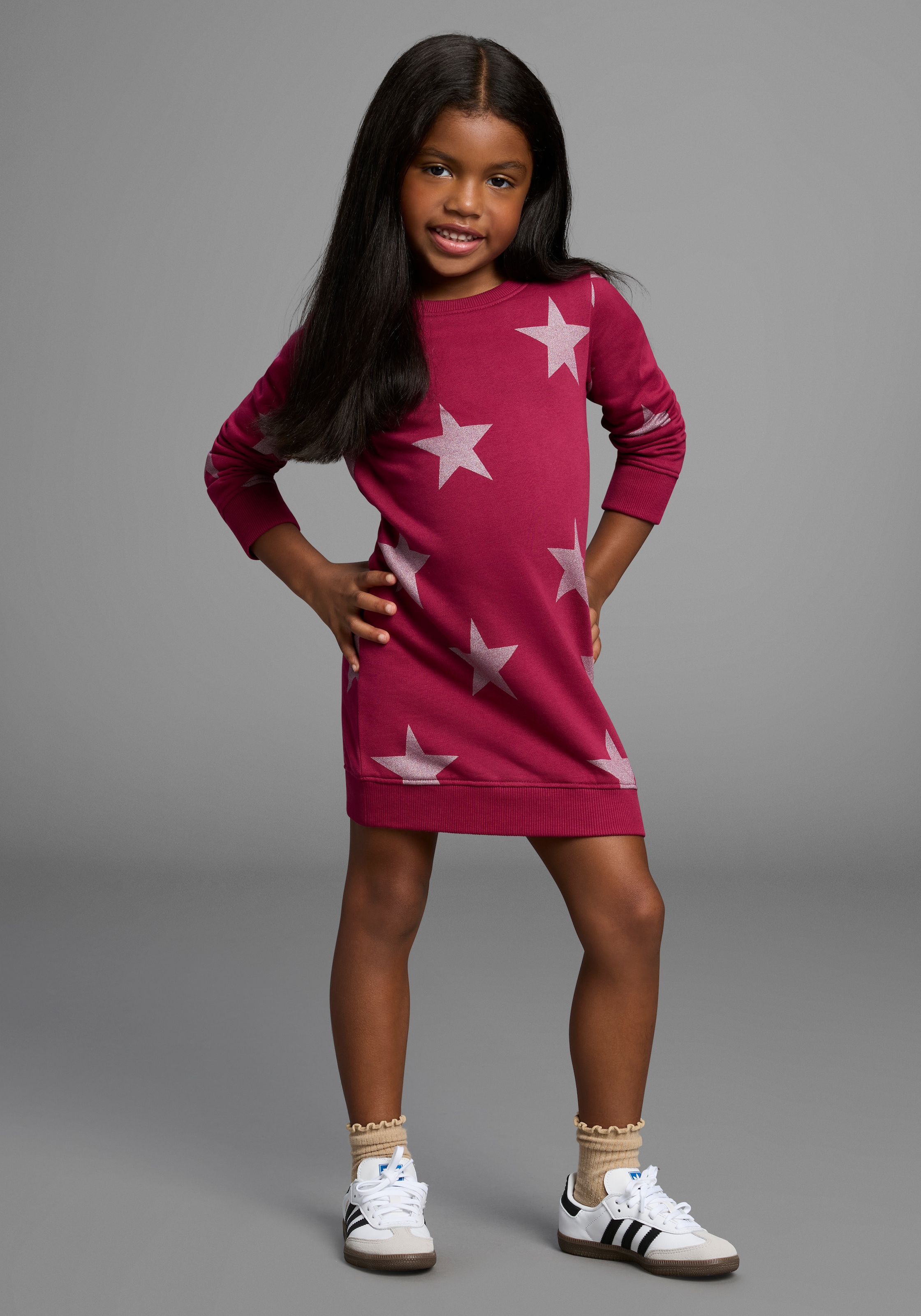 KIDSWORLD Sweatkleid »Sterne-Allover Kleid für kleine Mädchen« Sweatkleid mit Glitzerdruck