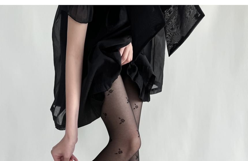 Allinya - Bloemen doorschijnende panty's