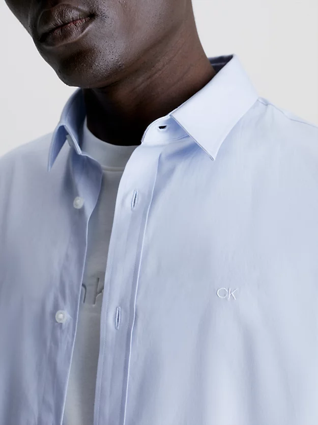 Camisa justa de popeline elástica