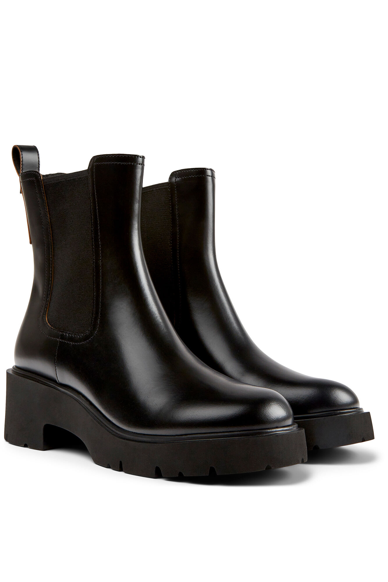 Botas femininas de couro com solado de EVA.