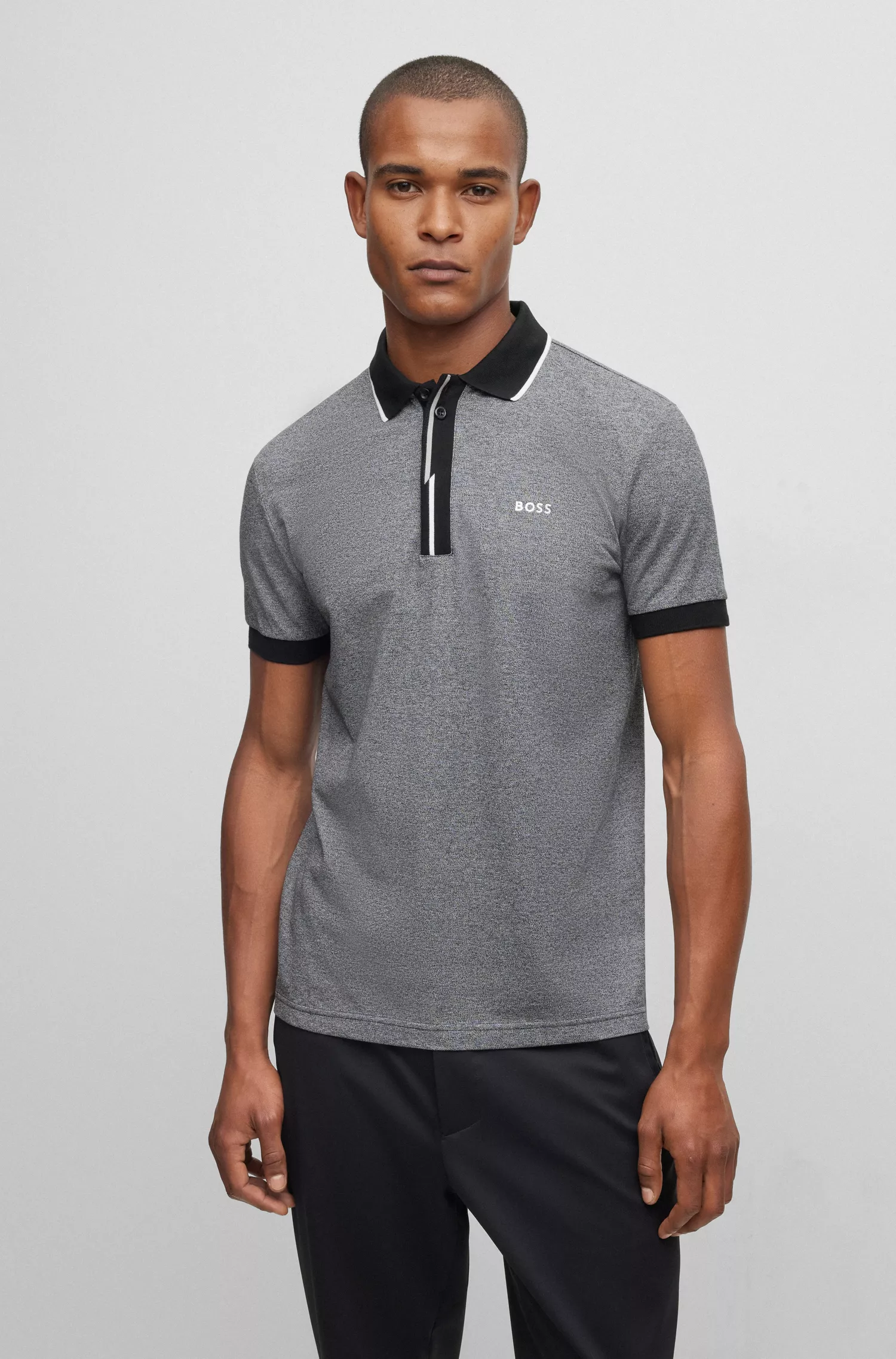 Camisa polo BOSS verde em piqué de algodão com logotipo bordado.