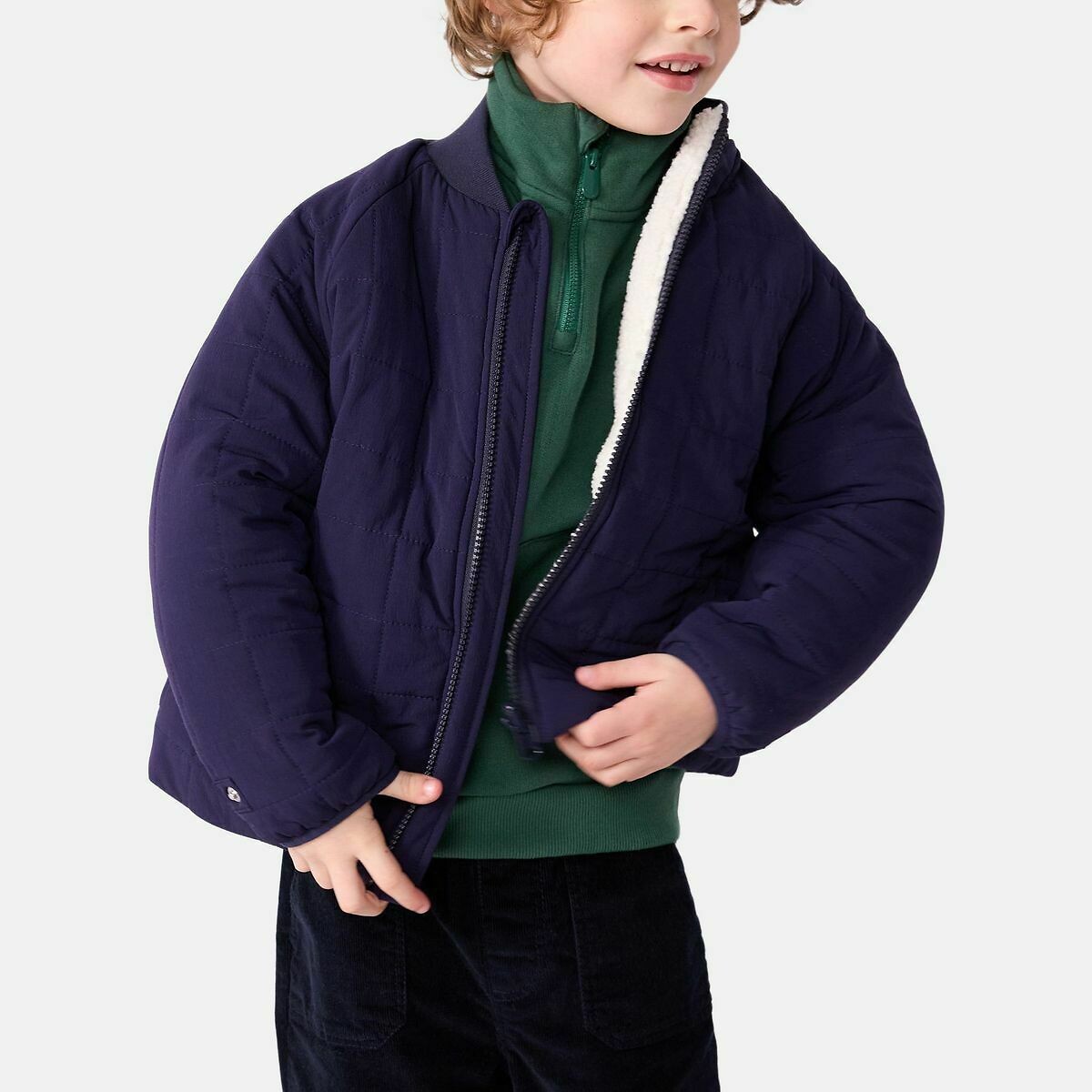 PETIT BATEAU<br>Capa de chuva 3 em 1, ideal para todas as estações.