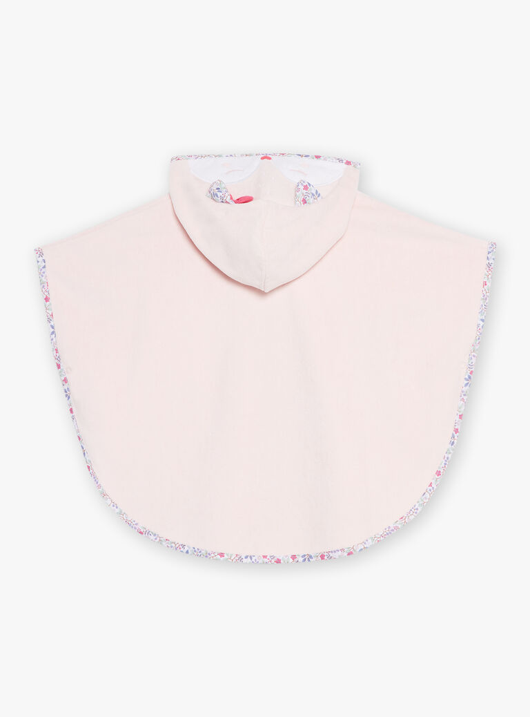 Cape de bain à capuche rose à motif fleuri.