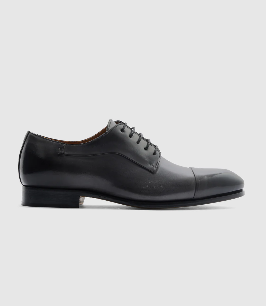 Derby couture en cuir noir 