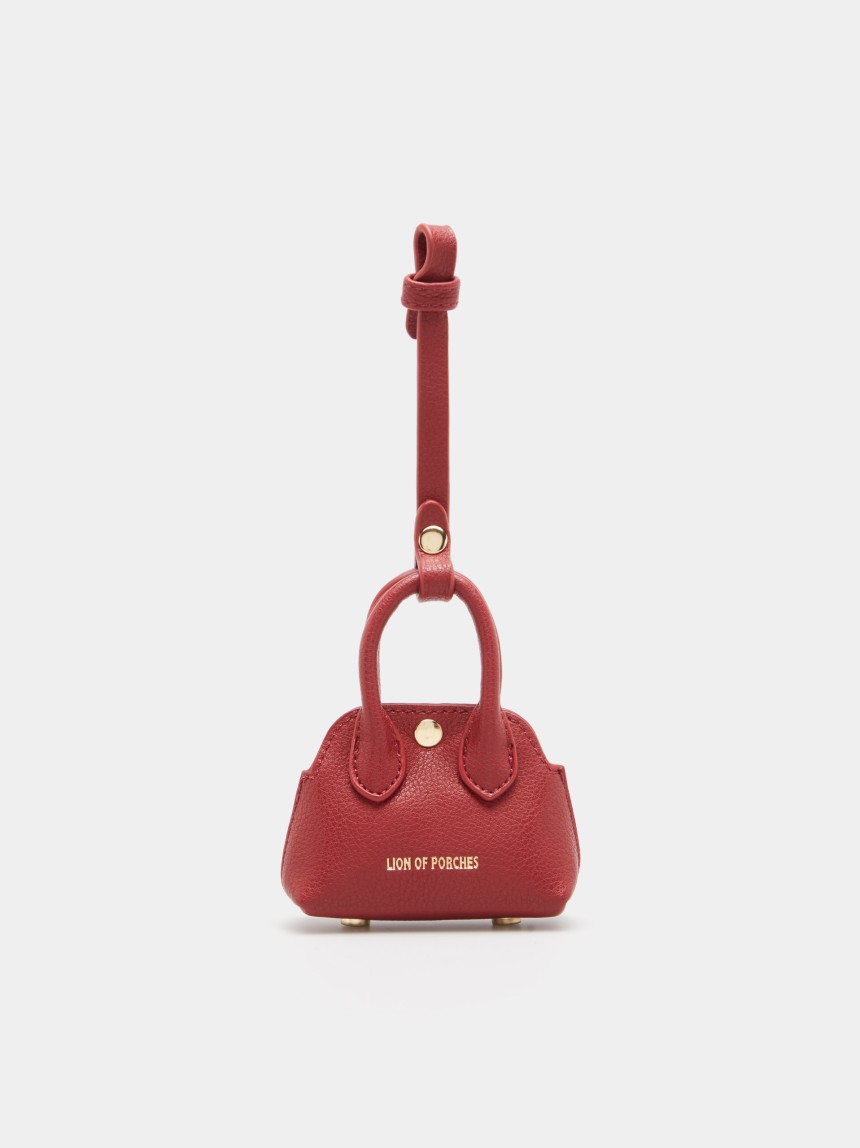 Porta-chaves charm em forma de mini mala