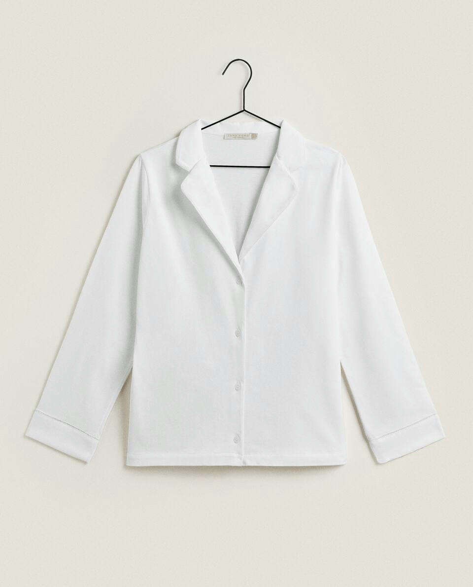 Camisa de algodão com detalhes em renda.
