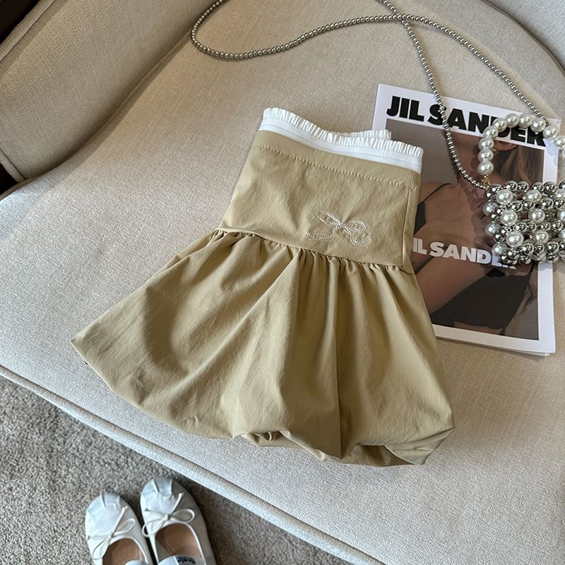 Bolgivy - Hoge taille rok met contrasterende rand en strikborduursel