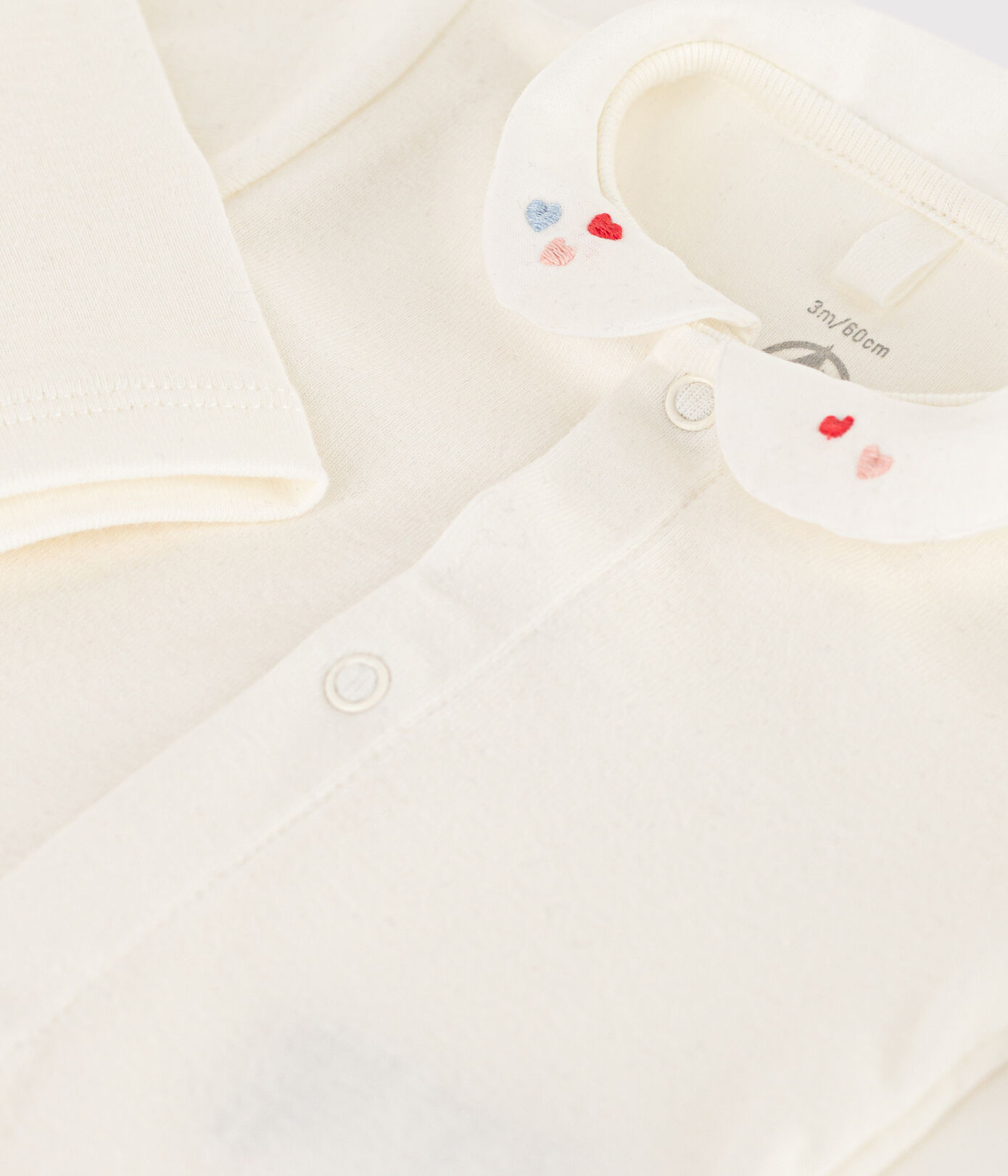 Body blanc à col bébé en coton biologique