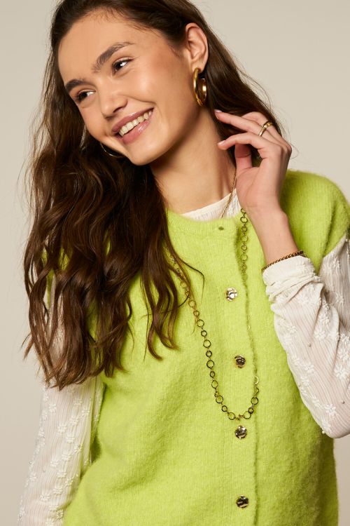 Limegroen gilet met fancy knopen