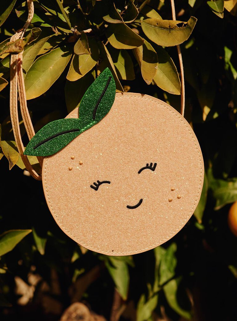 Sac rond orange à bandoullière et forme clémentine