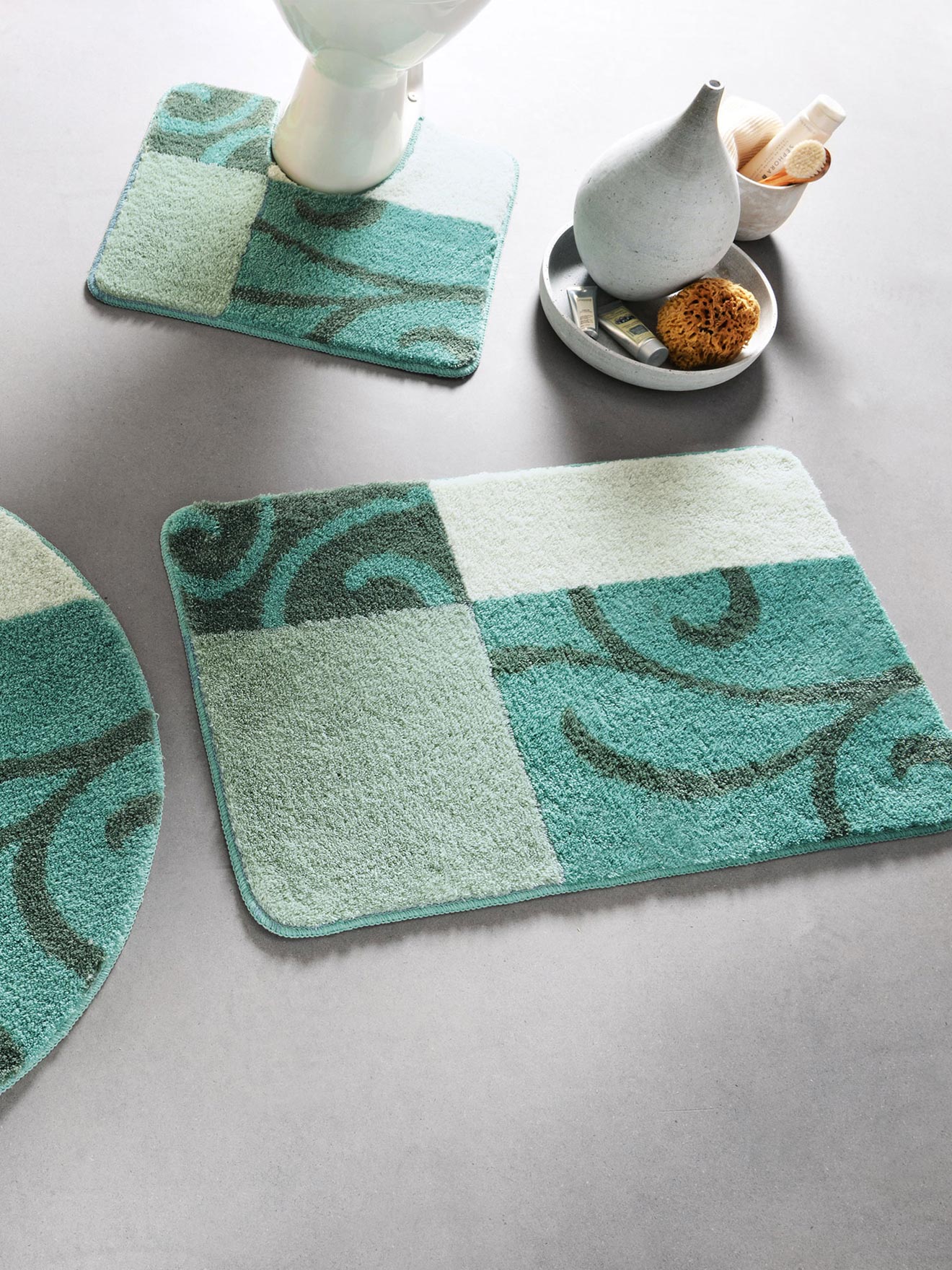 Tapis de bain motif volutes