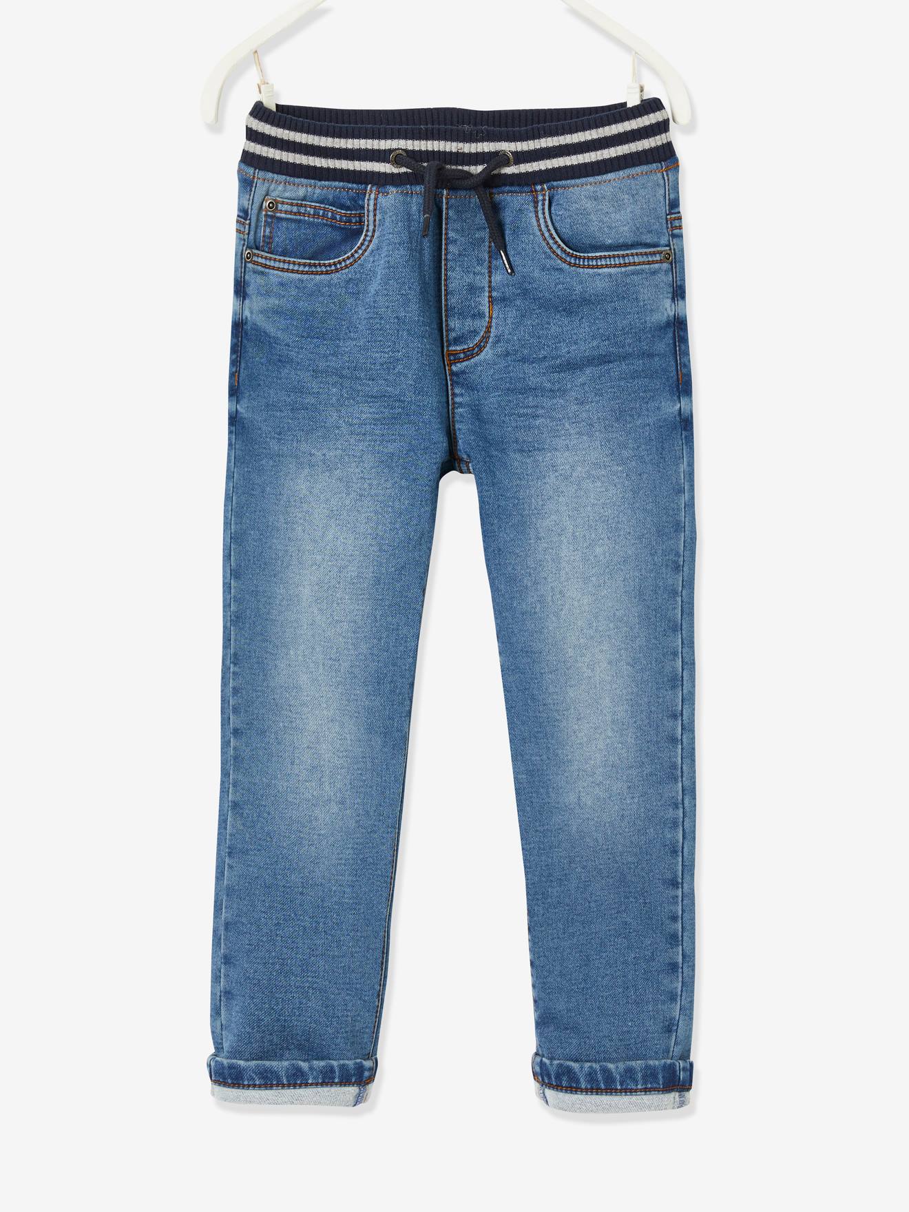 Calças de lã com efeito jeans e interior azul escuro e aconchegante.