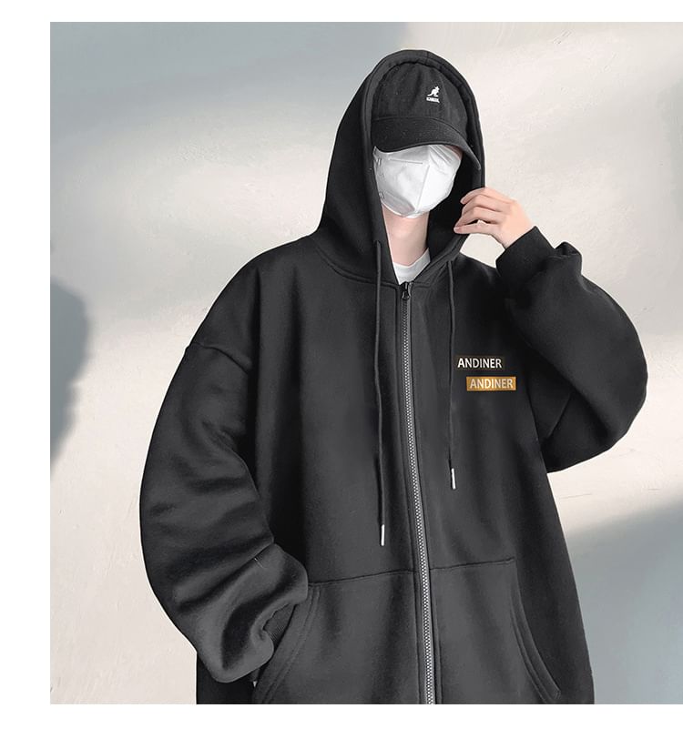 FOEV - Oversized hoodie met rits en tekstprint