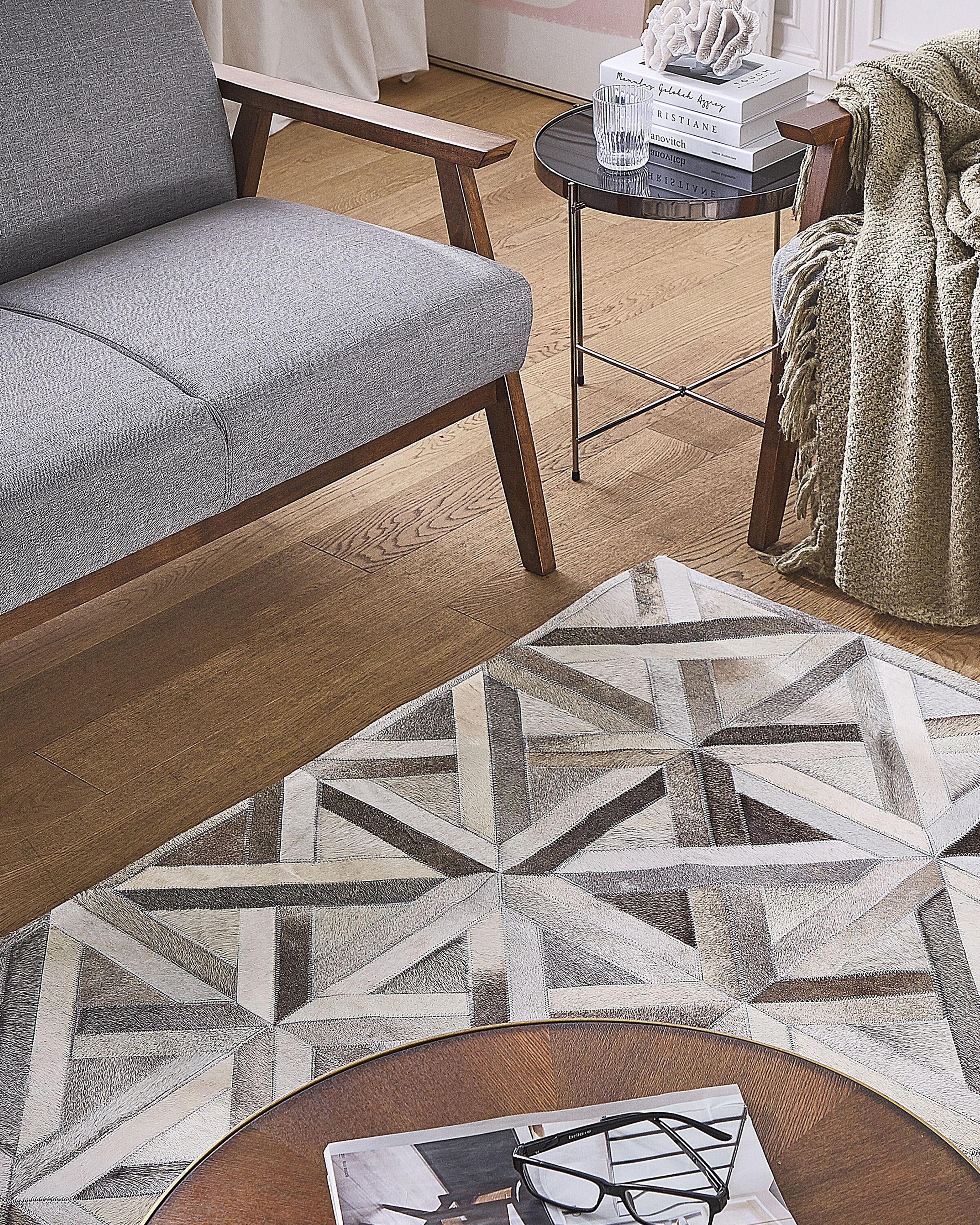 Vloerkleed TAYTAN Beige 140 x 200 cm Leer