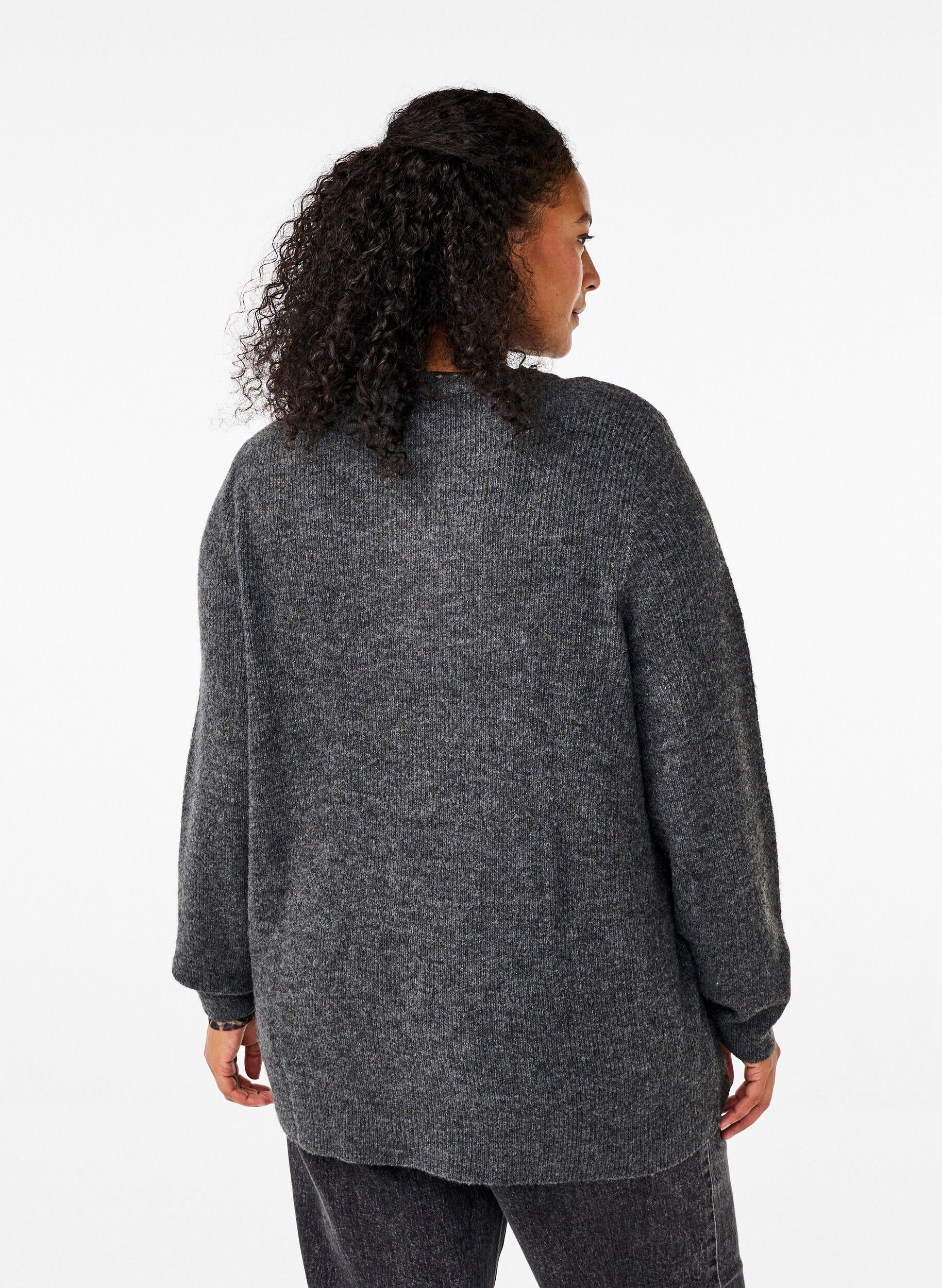Meleret strikbluse med rund hals