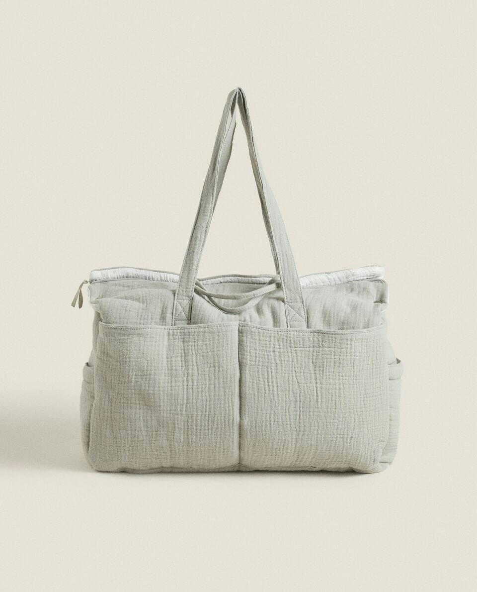 BOLSA DE MATERNIDADE COM ESTAMPA DE TREVO