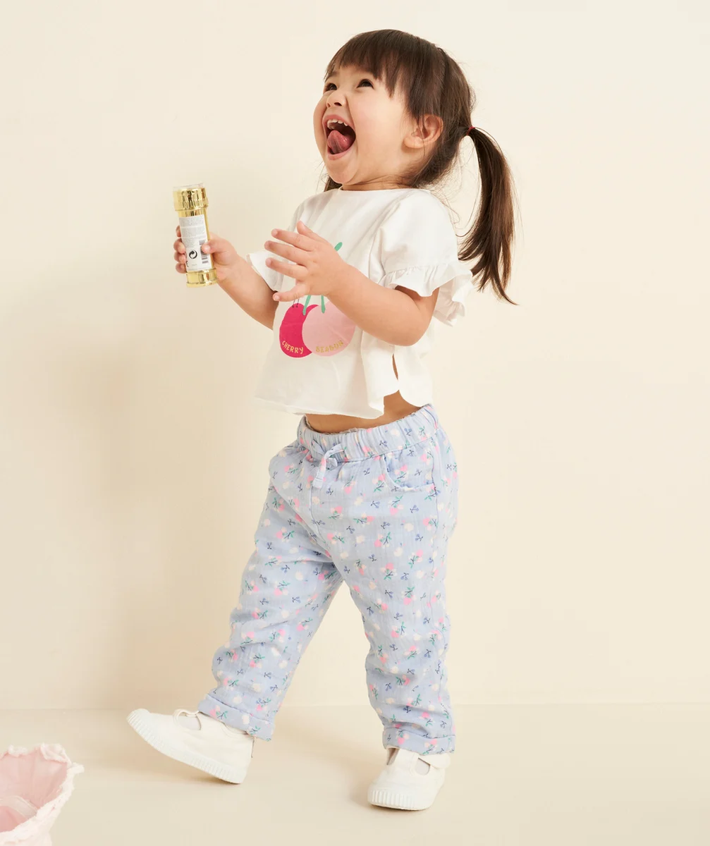 pantalon droit bébé fille en gaze de coton bleu imprimé à fleurs