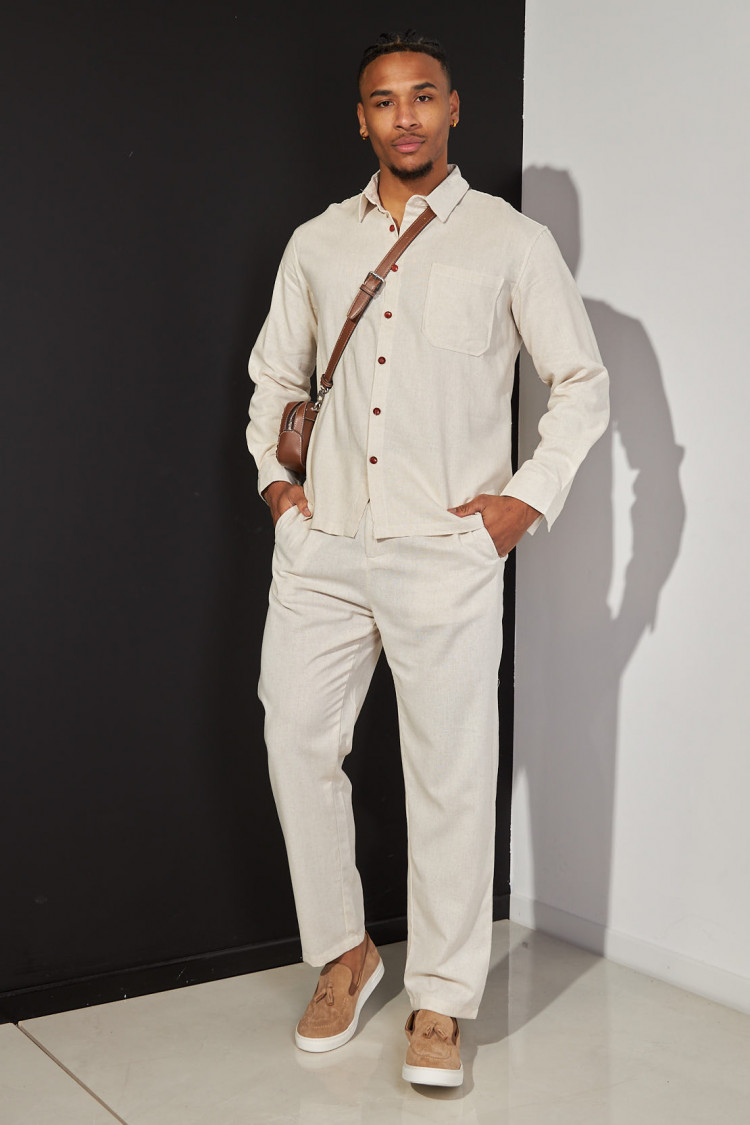 Chemise en lin beige à boutons rouge