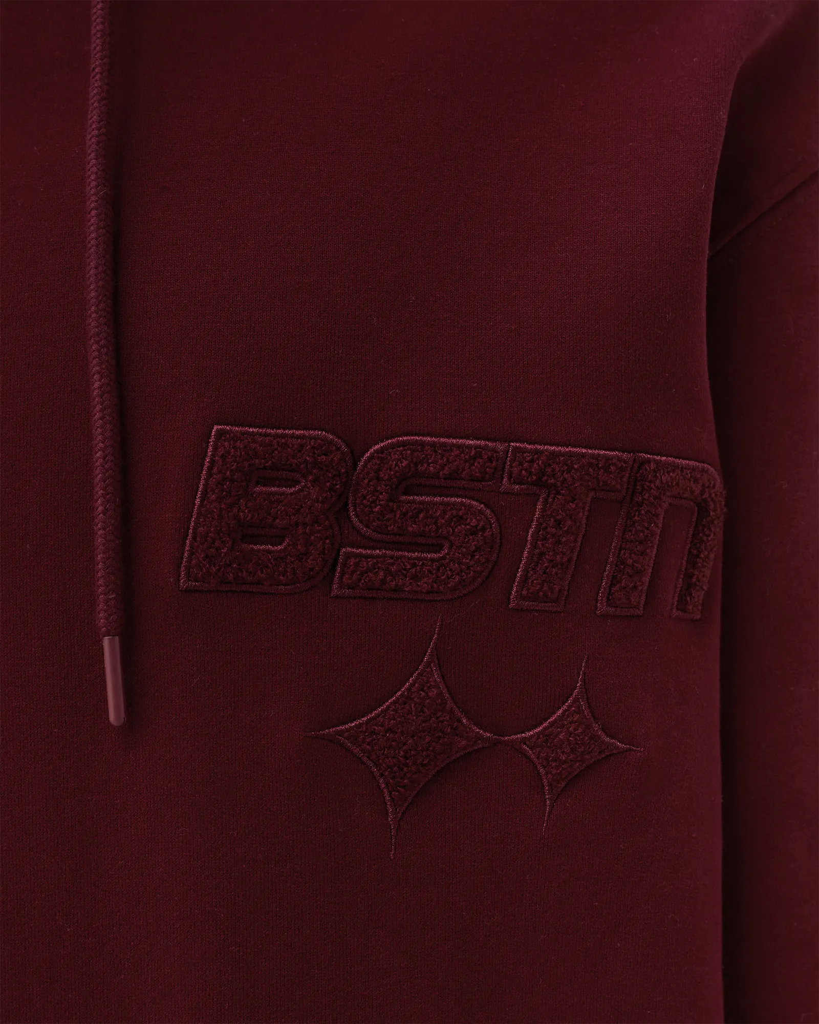 Moletom com capuz e logo da marca BSTN