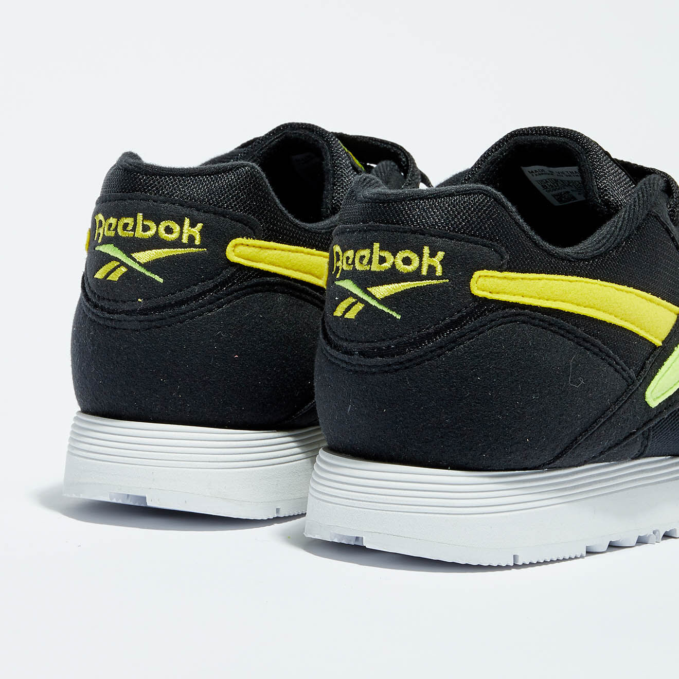 Reebok Baskets Rapide Mu noir/jaune